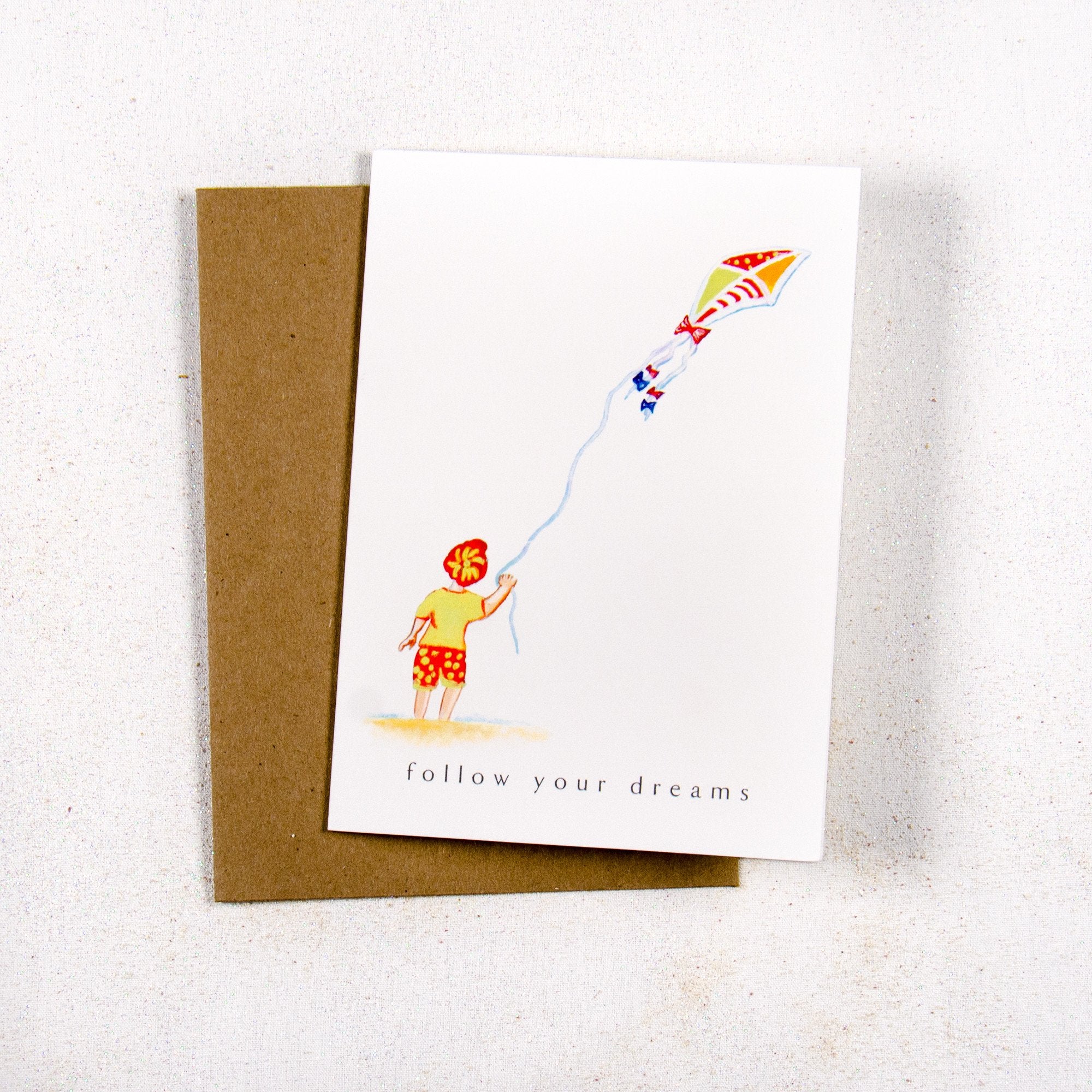 Follow your dreams Child on the Beach Greeting card
